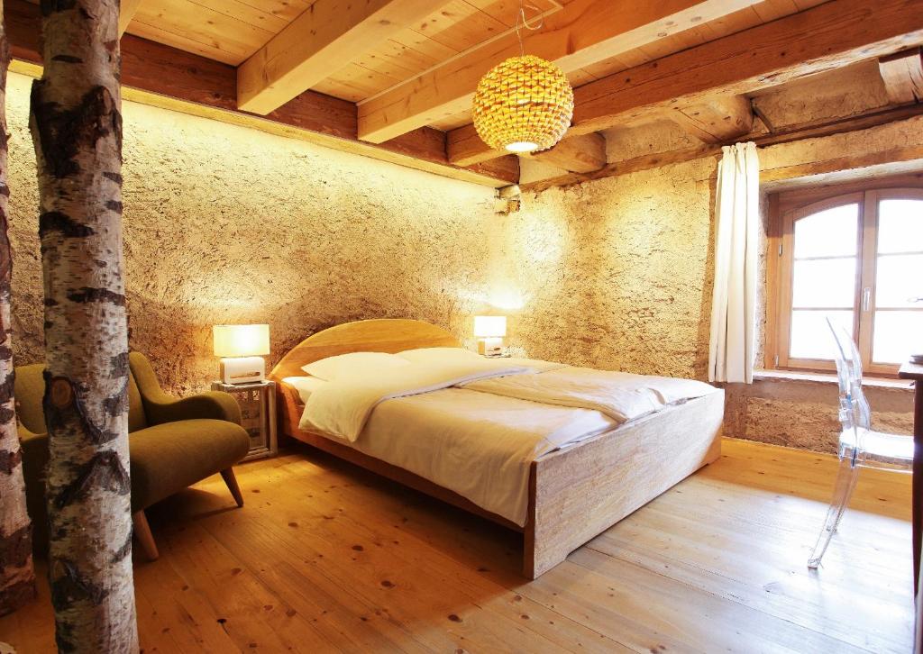 Postel nebo postele na pokoji v ubytování hotel rainhof scheune & naturpark restaurant (Kirchzarten)