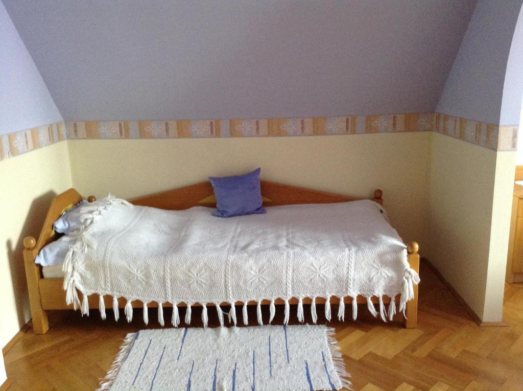 Postel nebo postele na pokoji v ubytování Főnix Fogadó