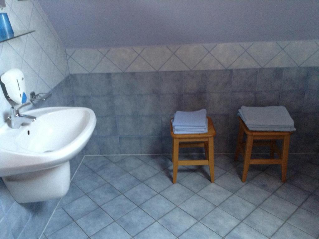 Koupelna v ubytování Főnix Fogadó