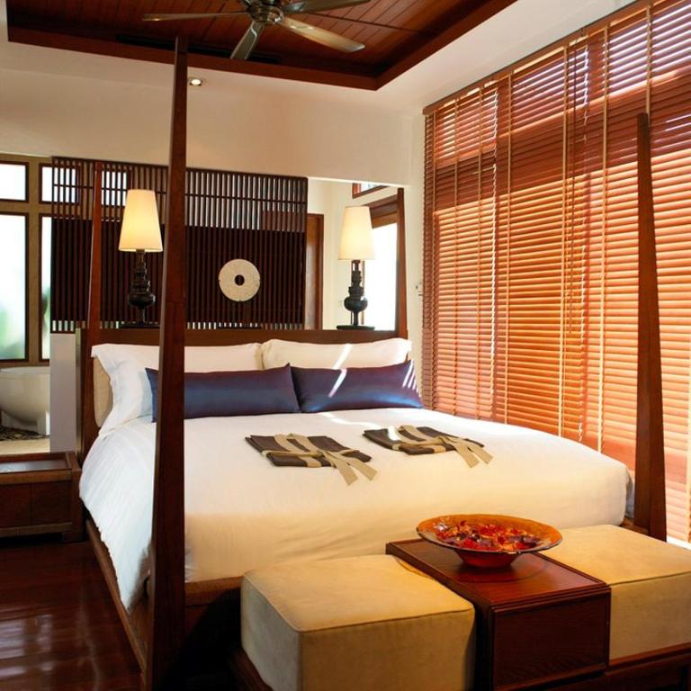 Postel nebo postele na pokoji v ubytování The Sarann, Koh Samui - Suites & Villas