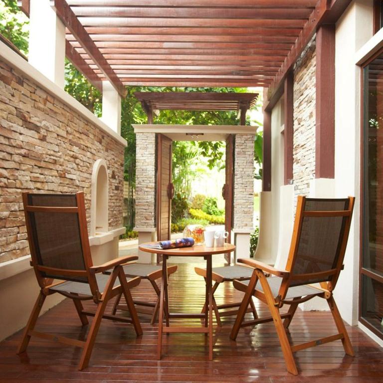Posezení v ubytování The Sarann, Koh Samui - Suites & Villas