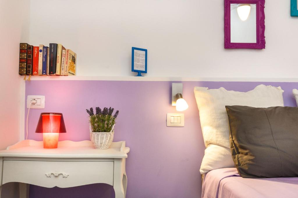 Postel nebo postele na pokoji v ubytování Girovagando B&B