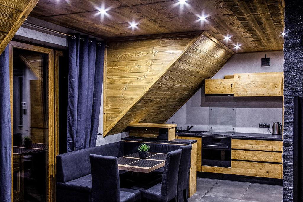 Kuchyň nebo kuchyňský kout v ubytování Apartament Mountain Chalet