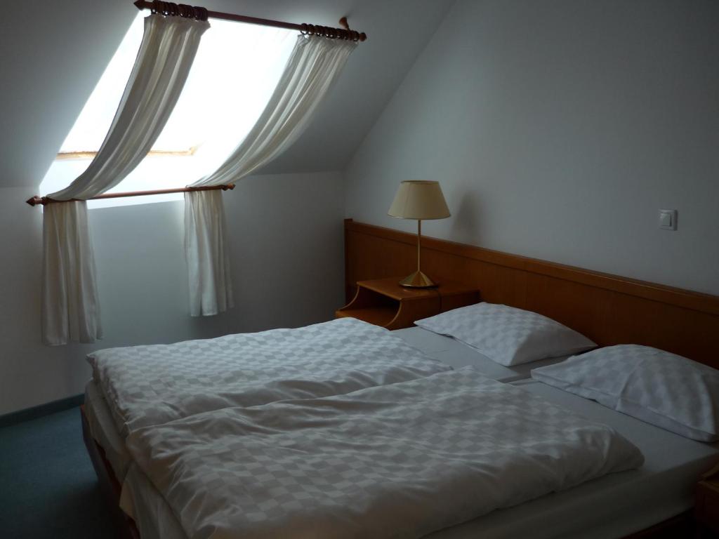 Posteľ alebo postele v izbe v ubytovaní Öreg Malom Hotel