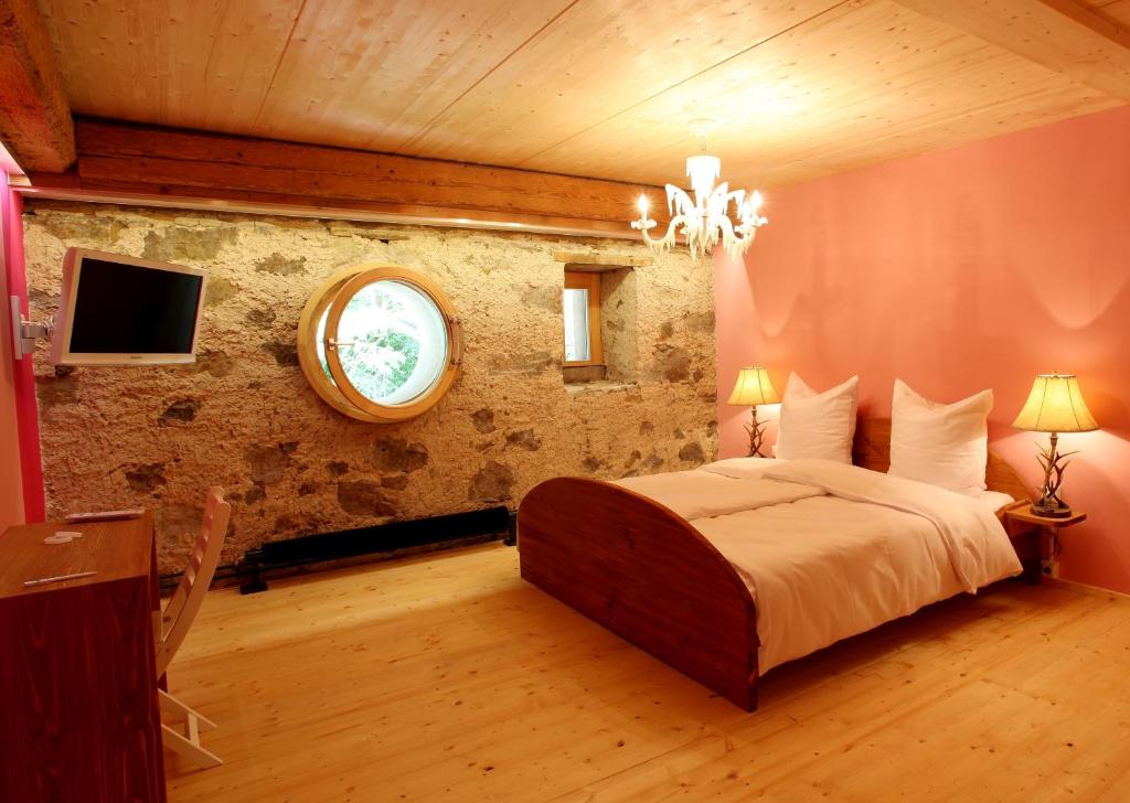 Postel nebo postele na pokoji v ubytování hotel rainhof scheune & naturpark restaurant (Kirchzarten)
