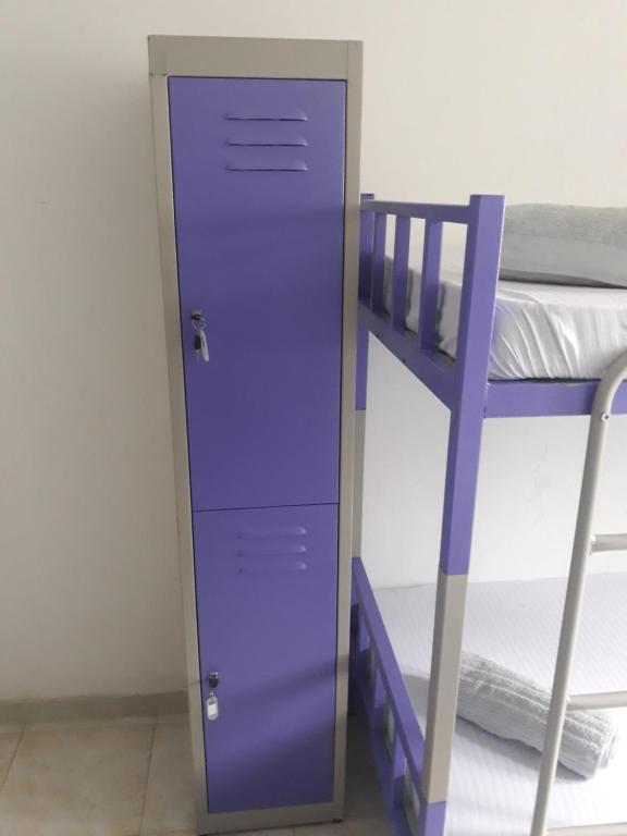 Palanda nebo palandy na pokoji v ubytování Coco Hostels - Weligama