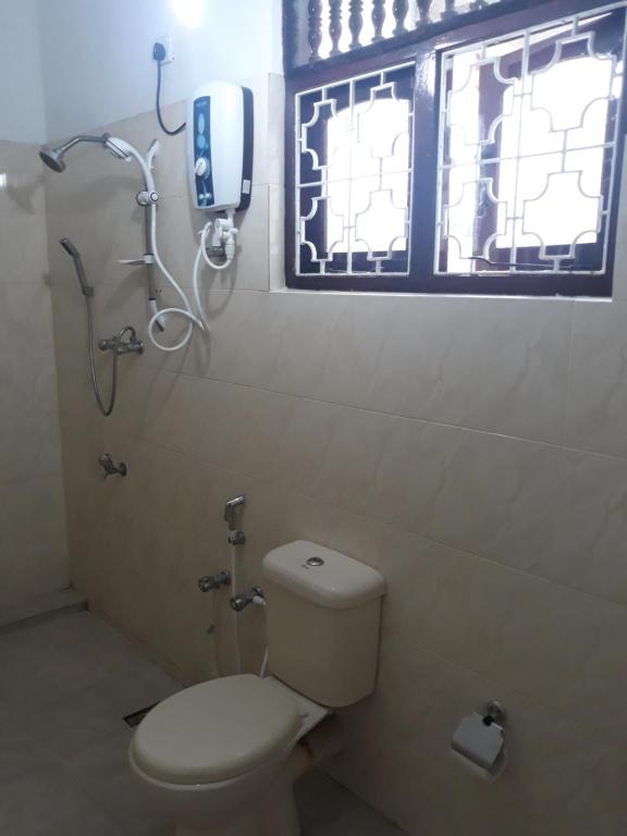 Koupelna v ubytování Coco Hostels - Weligama