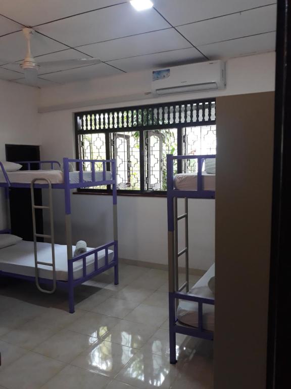 Postel nebo postele na pokoji v ubytování Coco Hostels - Weligama