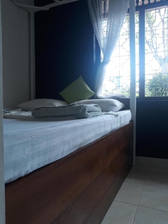 Postel nebo postele na pokoji v ubytování Coco Hostels - Weligama