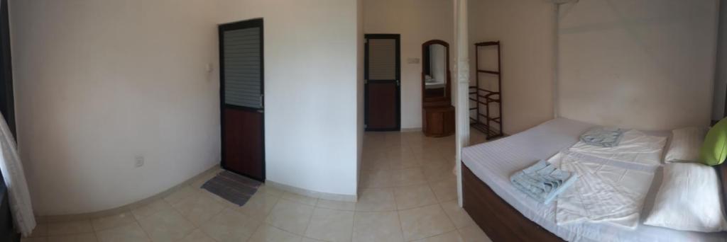 Postel nebo postele na pokoji v ubytování Coco Hostels - Weligama