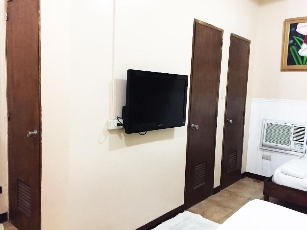 TV a/nebo společenská místnost v ubytování My Vigan Home Hotel
