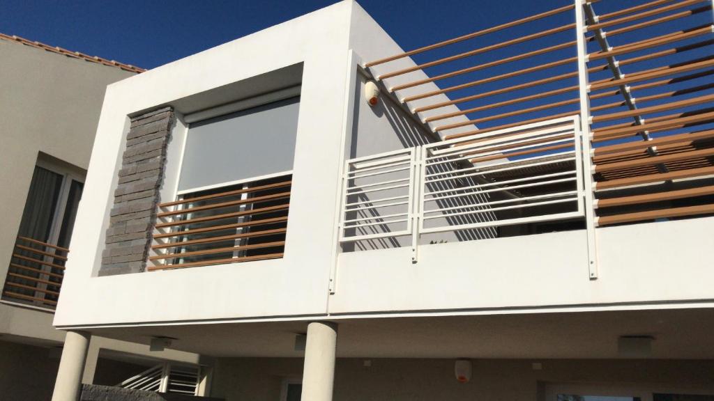 A balcony or terrace at I Giardini di Pula "La terrazza"