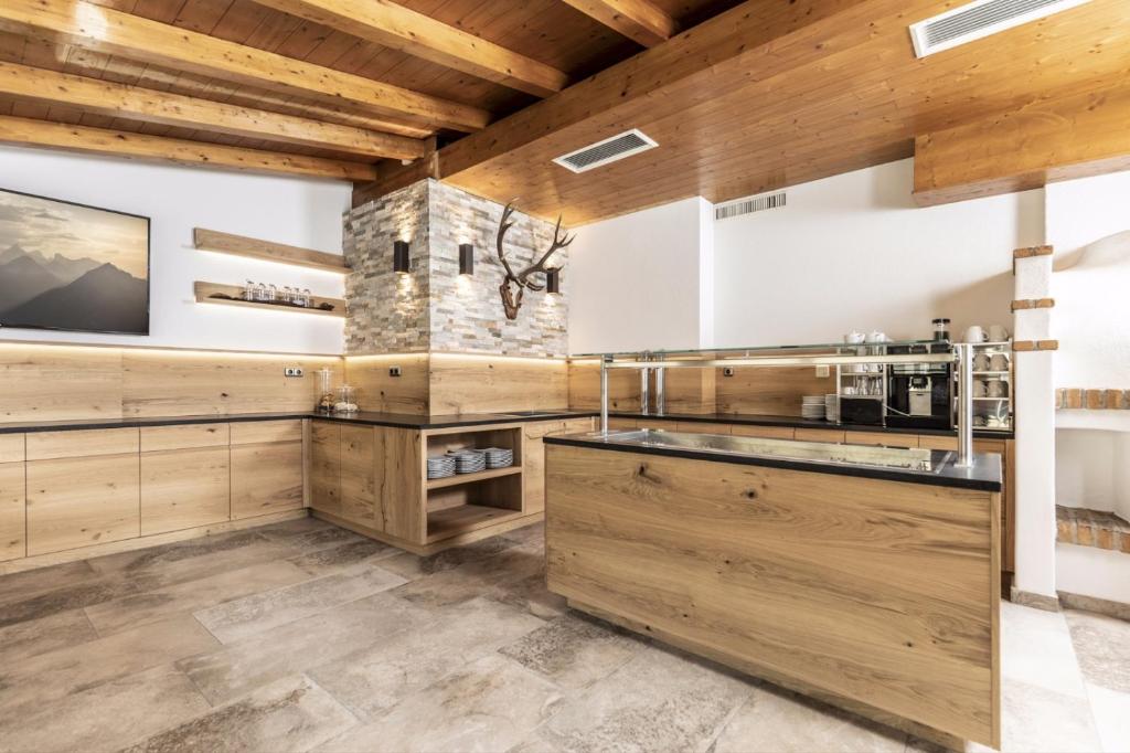 Kuchyň nebo kuchyňský kout v ubytování Hotel Jagdhof
