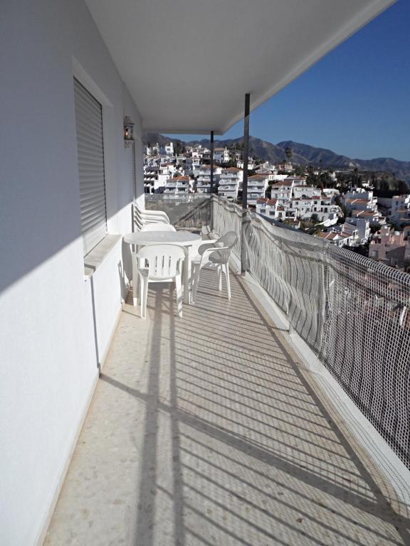 A balcony or terrace at AGUAMARINA 12 MENYBER