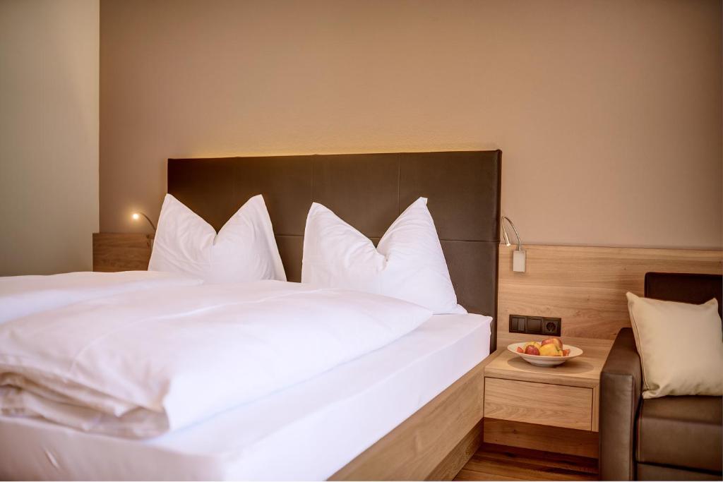 Postel nebo postele na pokoji v ubytování Hotel Lamm