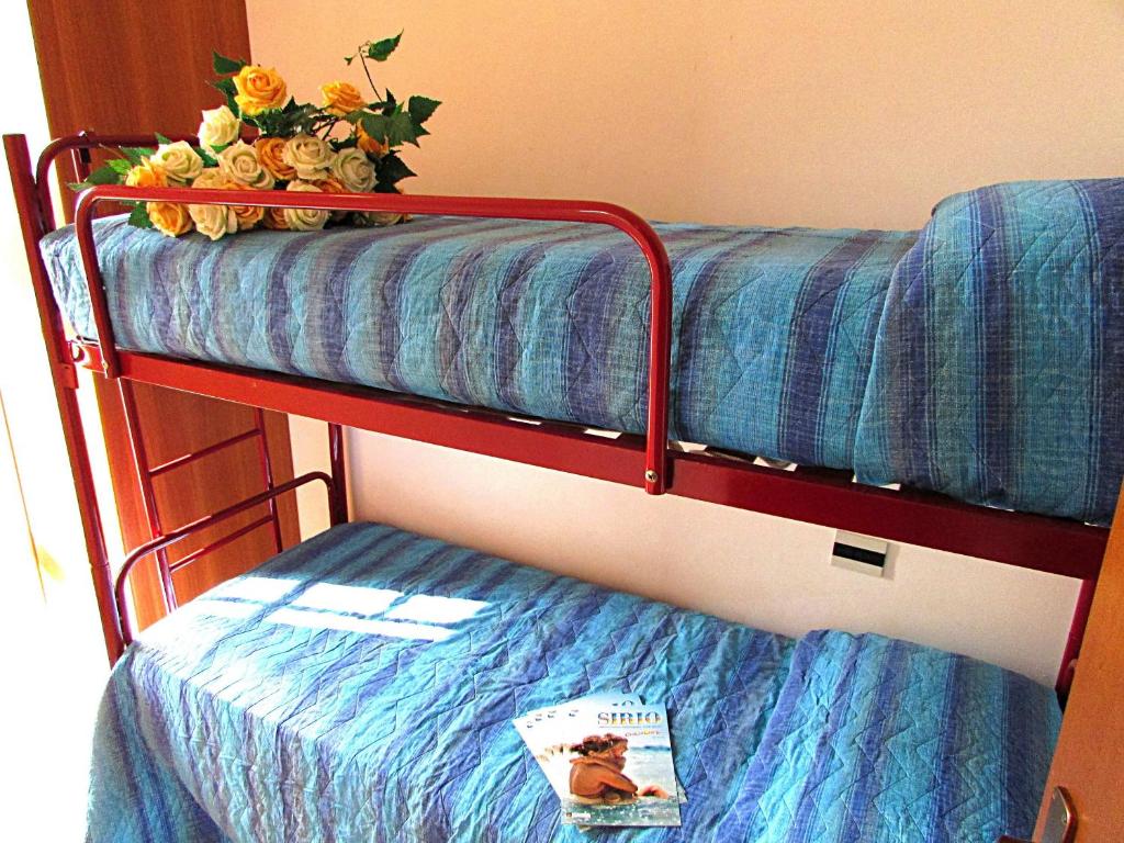 A bed or beds in a room at Andrea