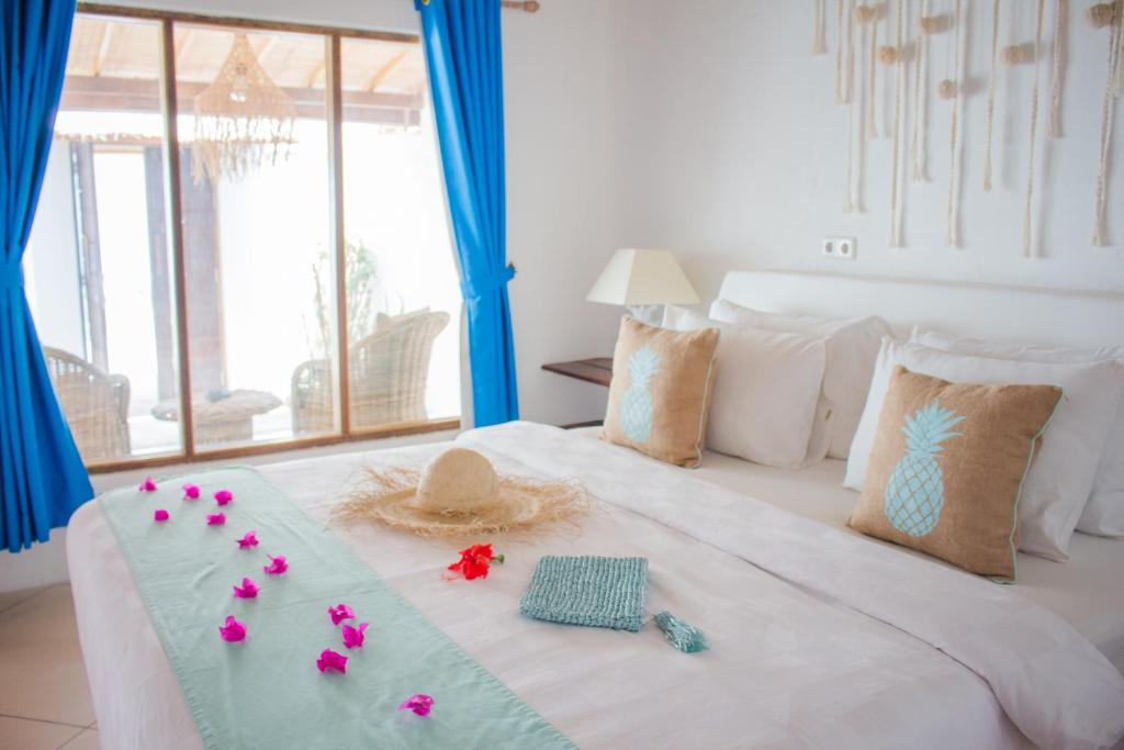 Postel nebo postele na pokoji v ubytování Sunrise Resort