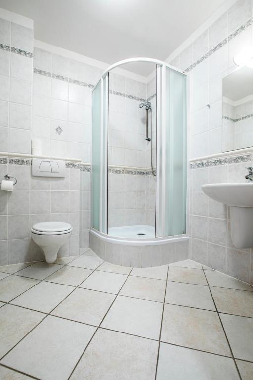Koupelna v ubytování Hotel U Zlatého kohouta