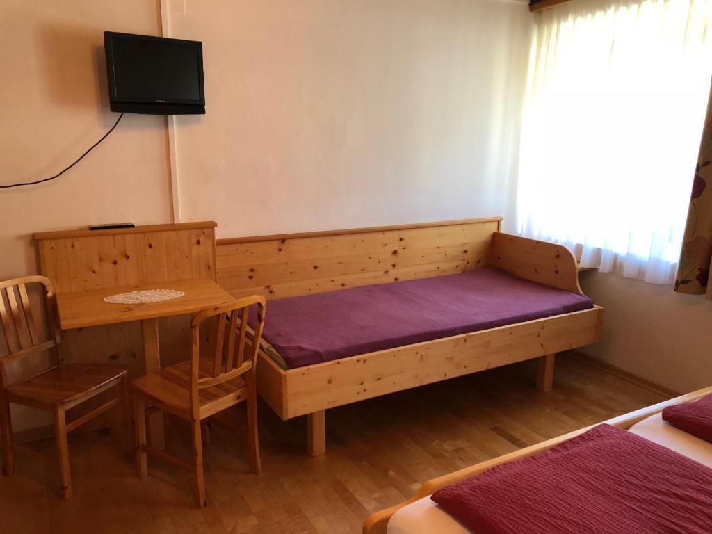 Postel nebo postele na pokoji v ubytování Pension & Ferienwohnung Dullnig