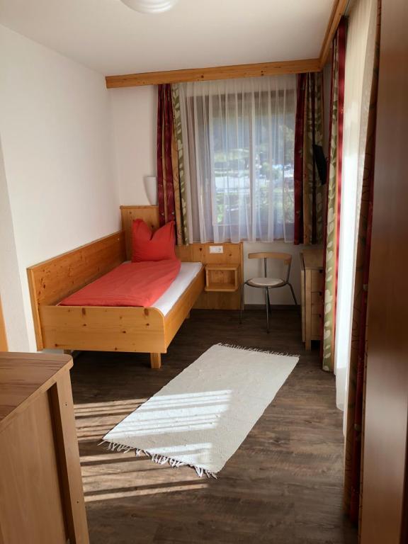 Postel nebo postele na pokoji v ubytování Pension & Ferienwohnung Dullnig