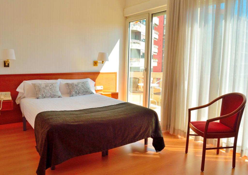 Postel nebo postele na pokoji v ubytování Hotel Ultonia
