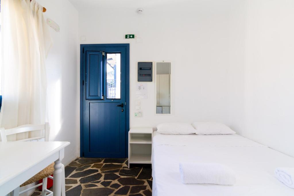 Posteľ alebo postele v izbe v ubytovaní Okirroi Villas Chersonissos