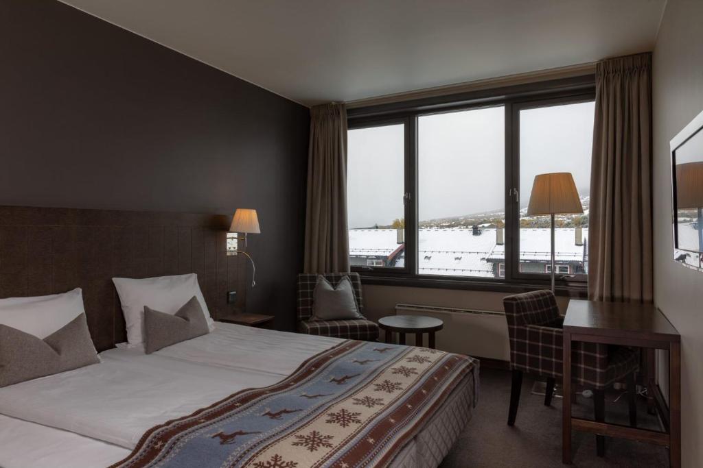 Postel nebo postele na pokoji v ubytování Quality Hotel Skifer