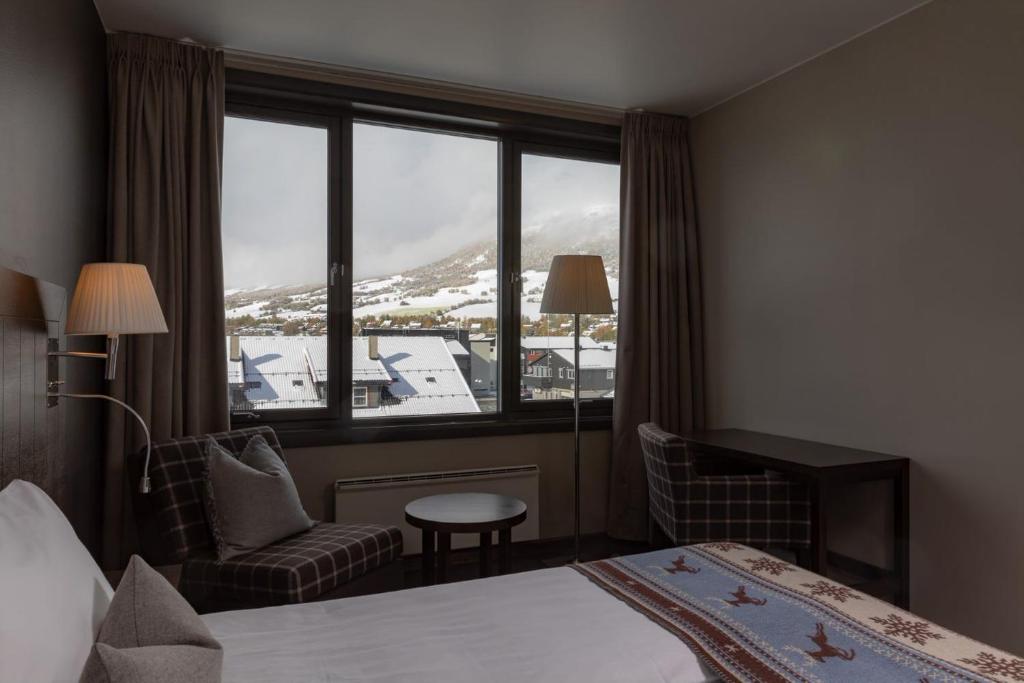 Postel nebo postele na pokoji v ubytování Quality Hotel Skifer