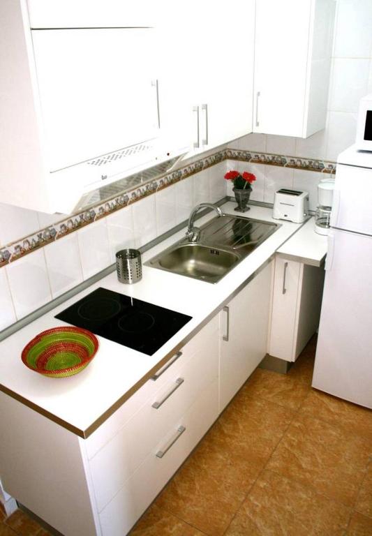 A kitchen or kitchenette at Céntrico apartamento 201
