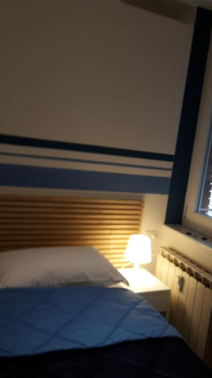 Postel nebo postele na pokoji v ubytování Parfumerie 5 Terre