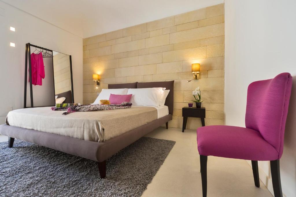 Postel nebo postele na pokoji v ubytování Sciala Ortigia B&B