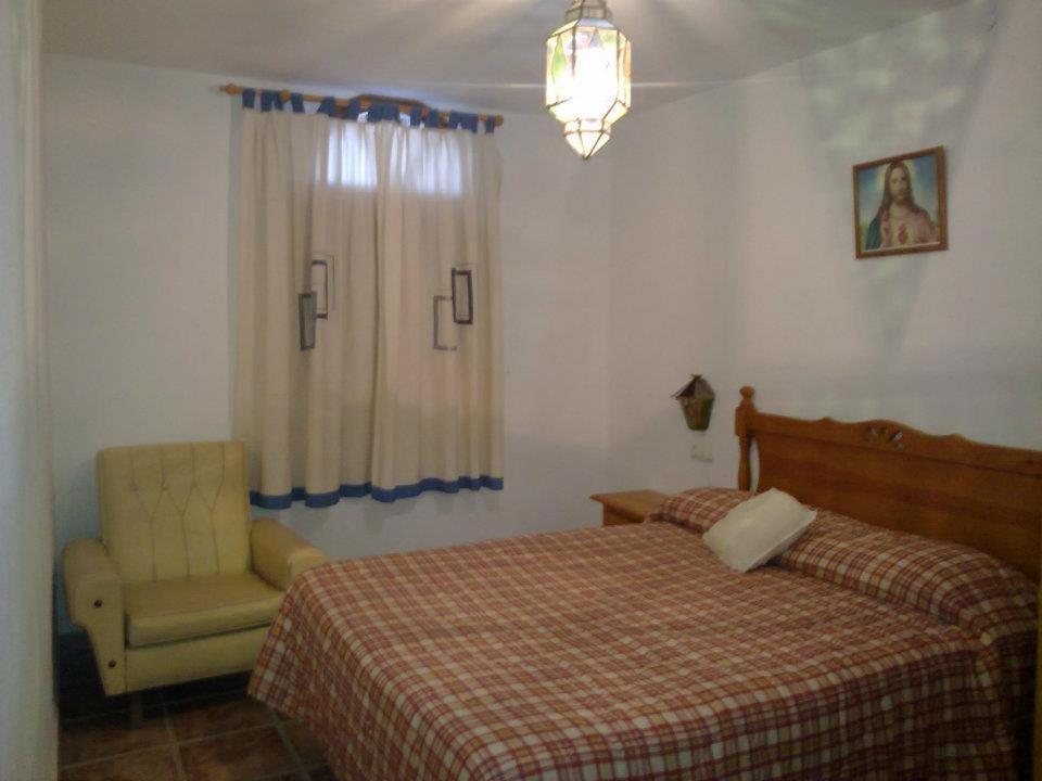 Postel nebo postele na pokoji v ubytování Casas Cueva Paloma