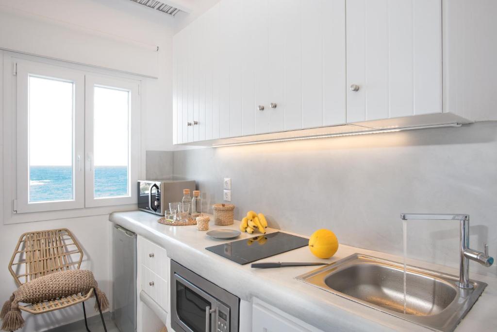 Kuchyň nebo kuchyňský kout v ubytování Perla Suites - Delmar Collection