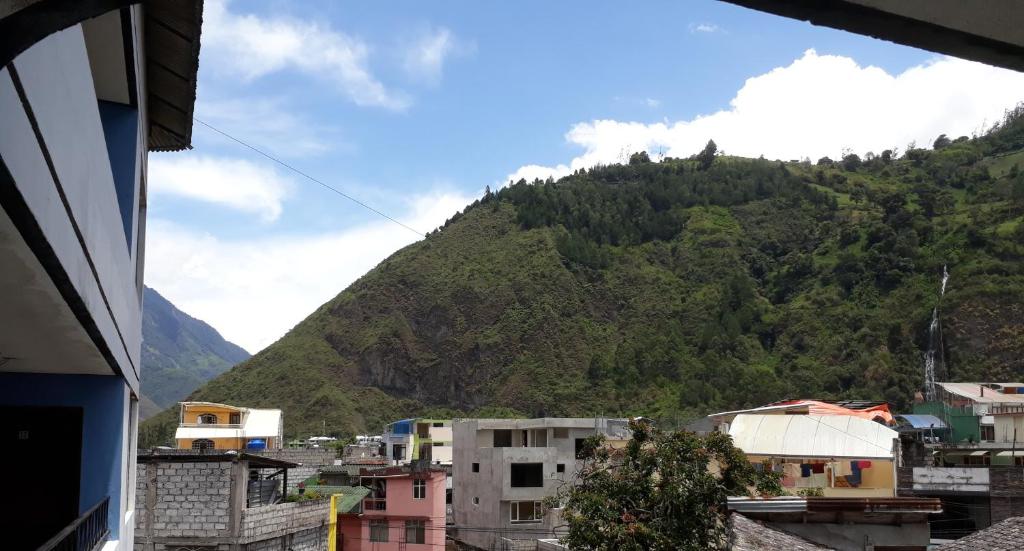 a view of a mountain from a city at Transilvania in Baños