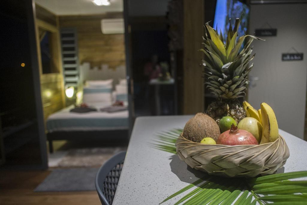 Postel nebo postele na pokoji v ubytování BUNGA-LODGE (bungalow 4* avec piscine privée)
