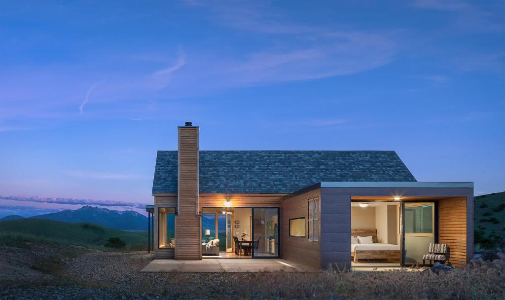 a house with a view of the mountains at Erik's Ranch in Livingston