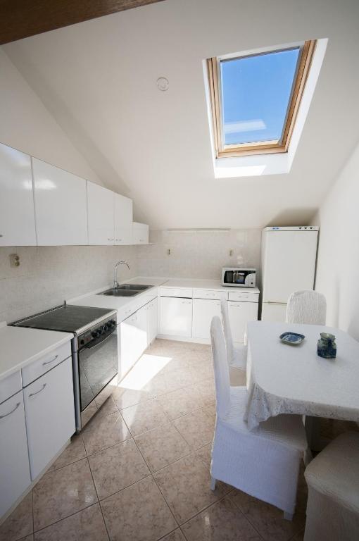 Kuchyňa alebo kuchynka v ubytovaní Župa Dubrovačka Guest House
