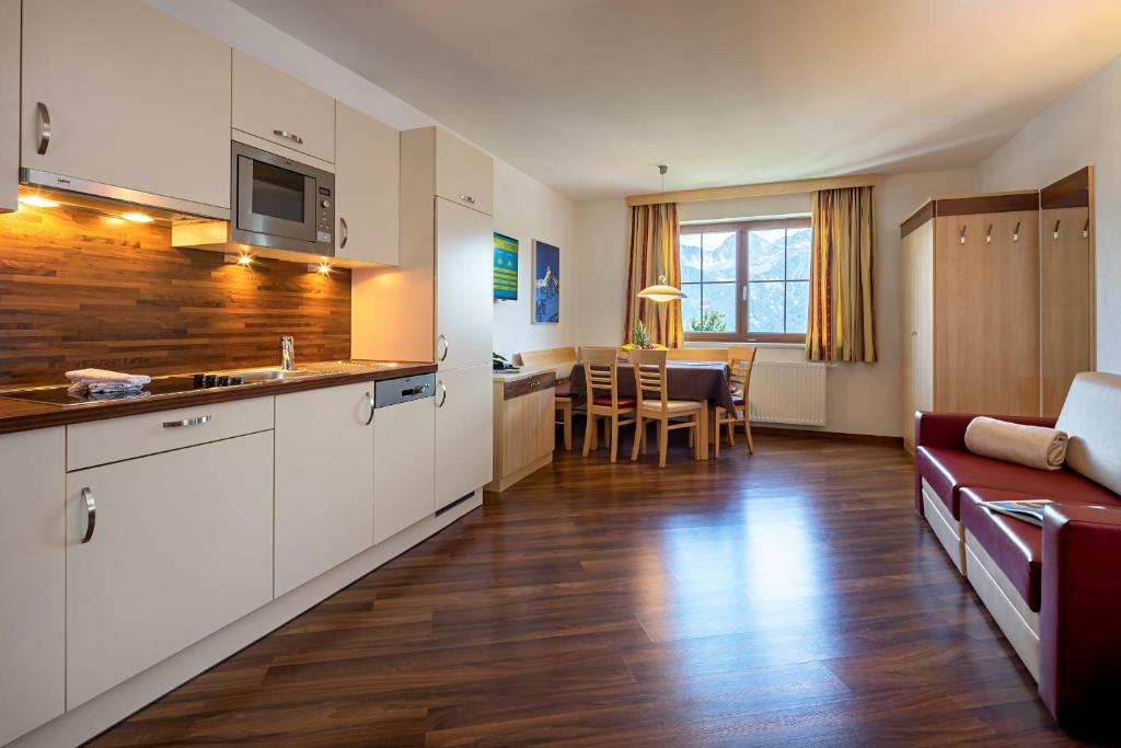 Kuchyň nebo kuchyňský kout v ubytování Apart-Hotel Aurora Fiss