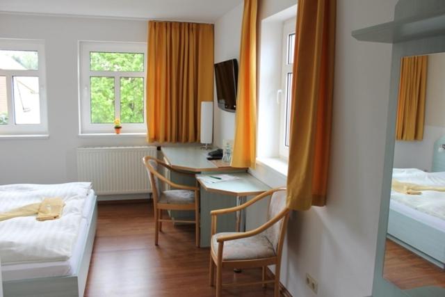 Postel nebo postele na pokoji v ubytování Lindenhof
