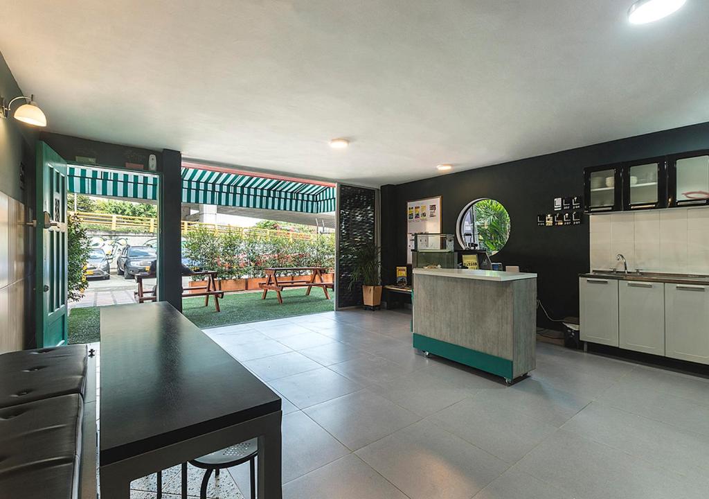 Kuchyň nebo kuchyňský kout v ubytování Living Hotel