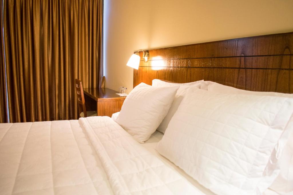 Postel nebo postele na pokoji v ubytování Hotel Hohenau