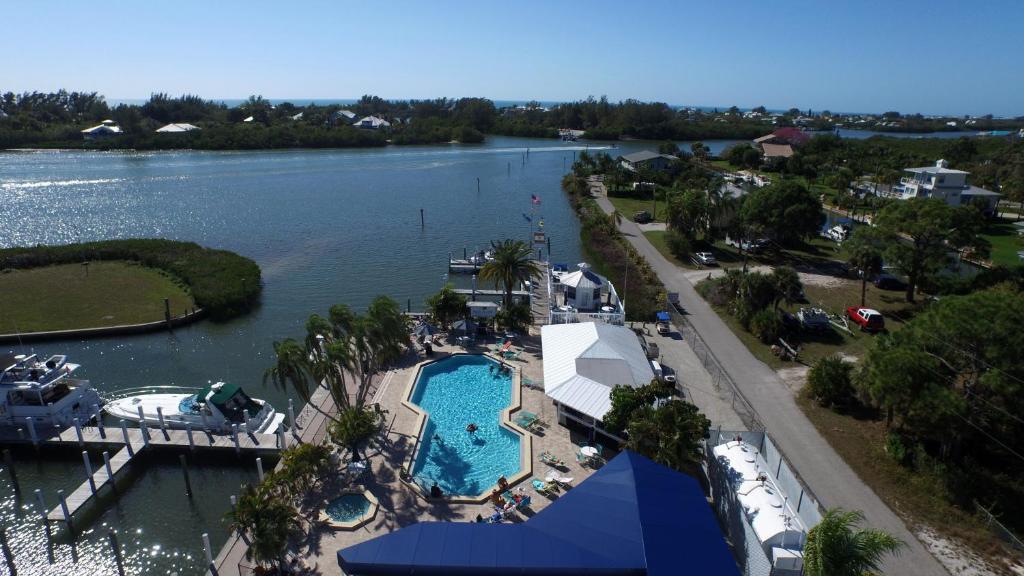 an aerial view of a marina with a swimming pool at Placida Condo #12279 in Placida