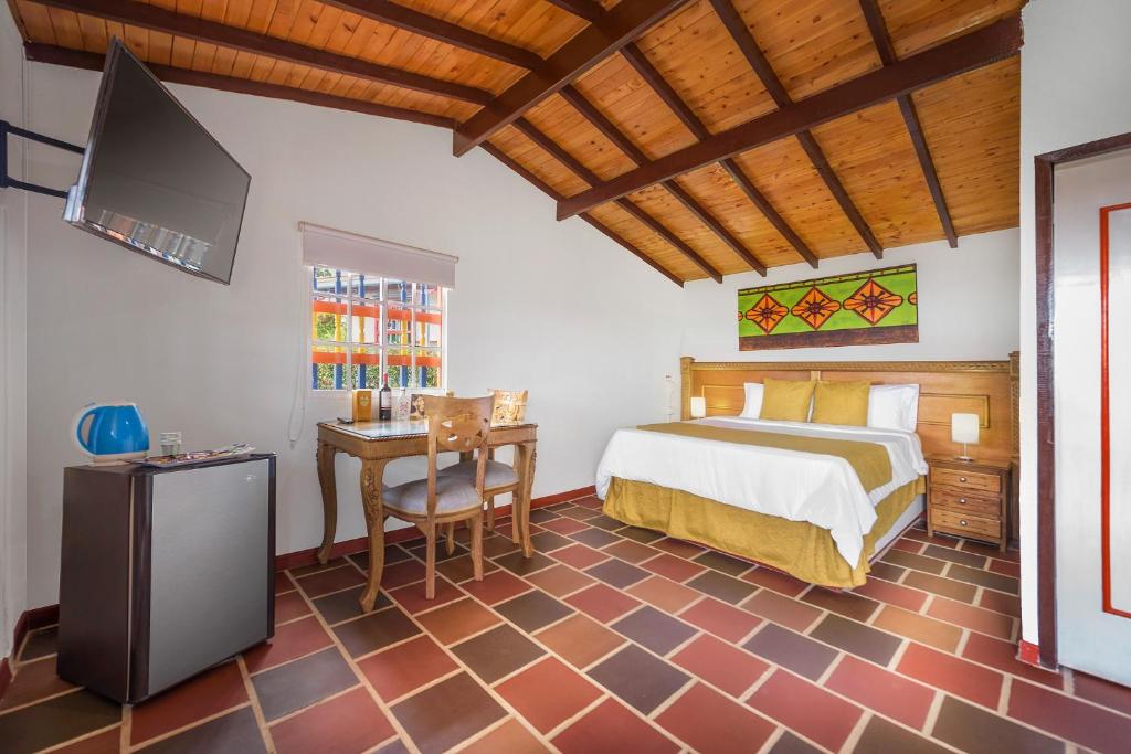 Postel nebo postele na pokoji v ubytování Hotel Zocalo Campestre
