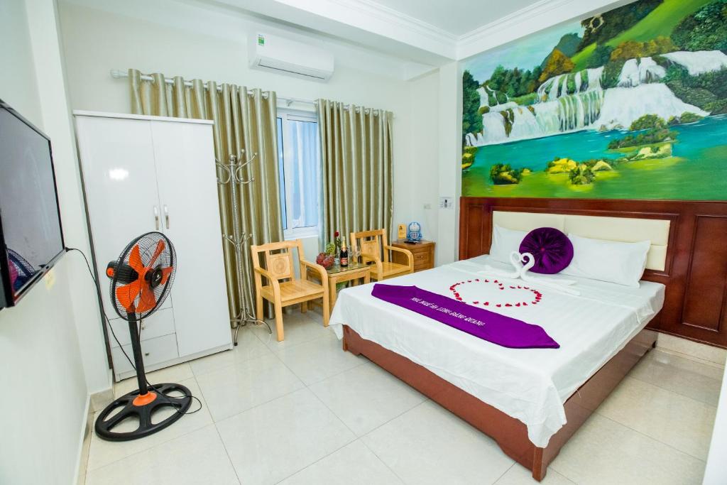 Postel nebo postele na pokoji v ubytování Dang Quang Guesthouse