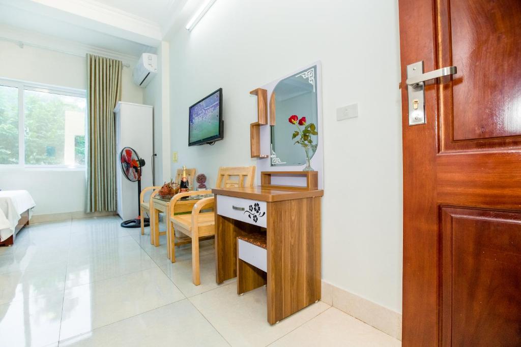 TV a/nebo společenská místnost v ubytování Dang Quang Guesthouse