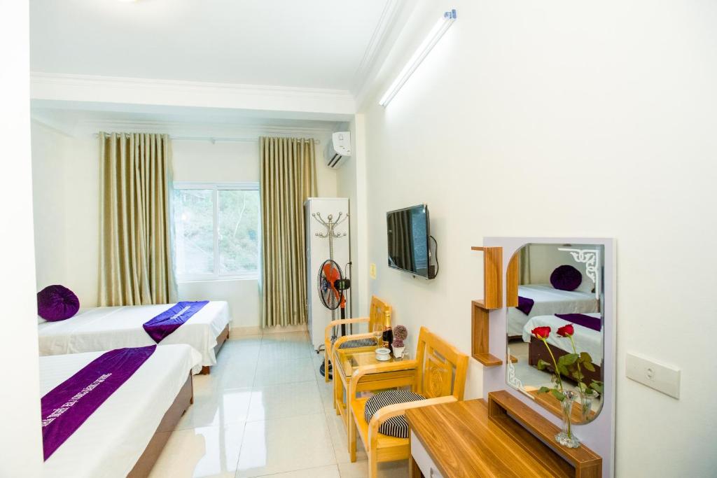 TV a/nebo společenská místnost v ubytování Dang Quang Guesthouse