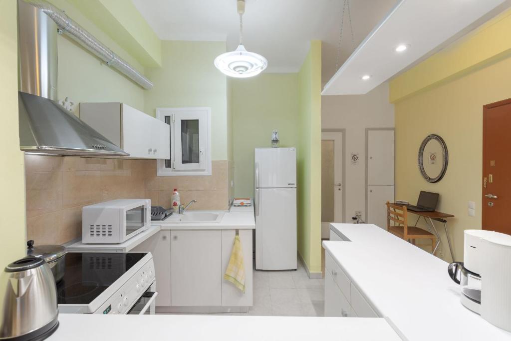 Kuchnia lub aneks kuchenny w obiekcie Athens Home 2