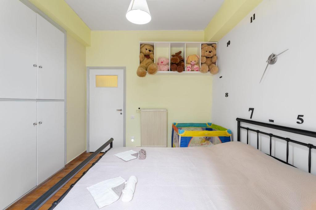 Łóżko lub łóżka w pokoju w obiekcie Athens Home 2