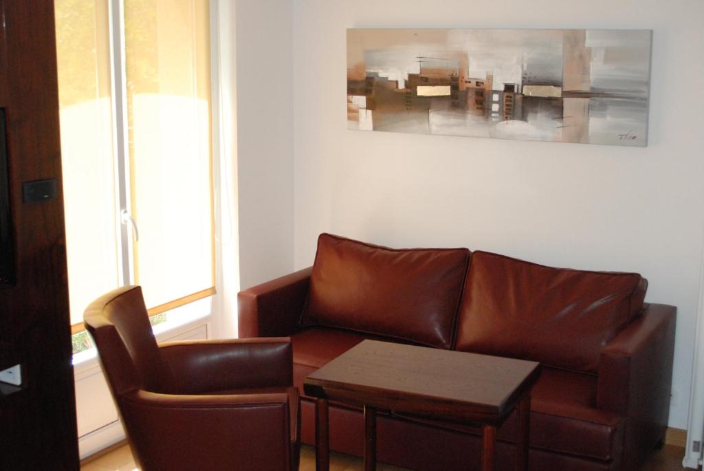 Posezení v ubytování Hôtel Ariane & SPA