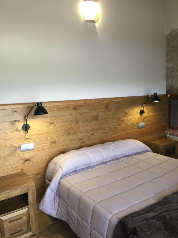Postel nebo postele na pokoji v ubytování Cal Pedrals Pairal
